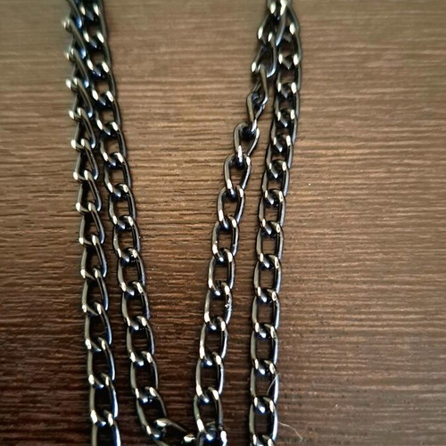 Necklace with diamond cut black chain and gold discs like new