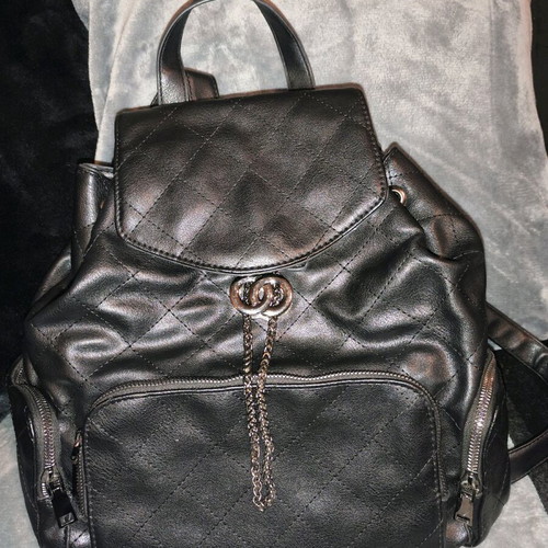 Backpack used, black with multiple pockets