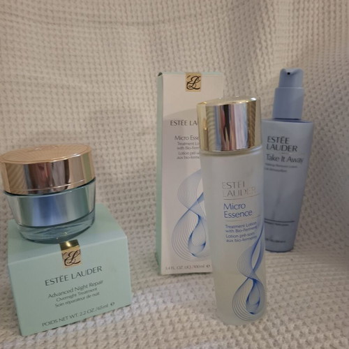 Estée Lauder cosmetic jars with Micro Essence lotion used set