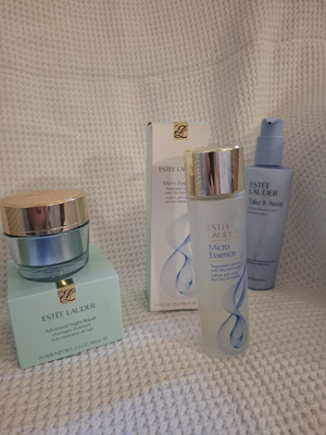 Άδεια βάζα καλλυντικών Estée Lauder και λοσιόν Micro Essence μεταχειρισμένα