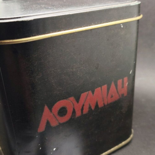 Vintage metal Loumidis tin used