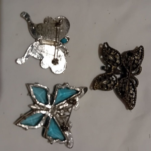 Butterfly pins pack of three used