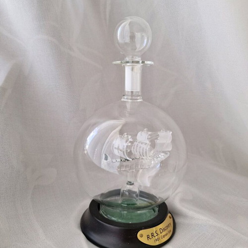 Glass ship in blown glass bottle like new