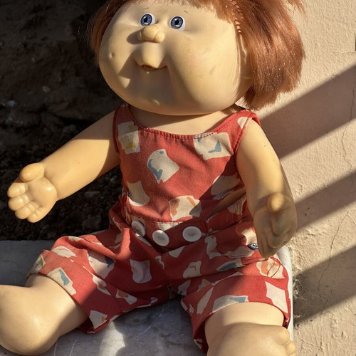 Vintage Cabbage Patch Kids doll used with clothes