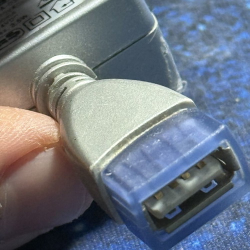 USB female wall adapter like new, parallel angle