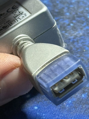 USB female wall adapter like new, parallel angle