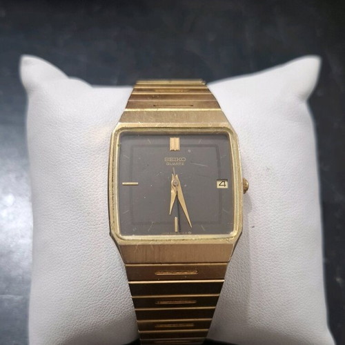 Seiko Quartz 6532-5260 vintage unisex watch black dial gold bracelet used