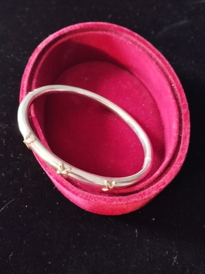 Silver bracelet with gold details used