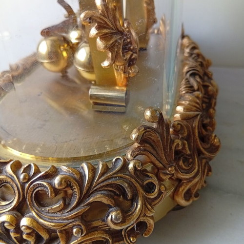 400-day mechanical clock with glass dome