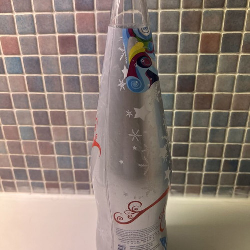 Aura Christmas collectible bottle 1 liter like new, empty