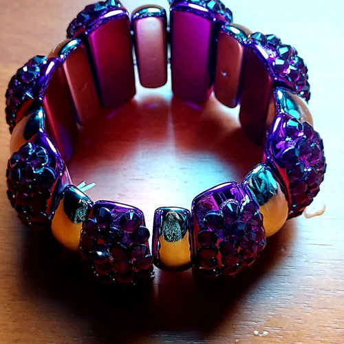 Bracelet with purple rhinestones and silver elements like new