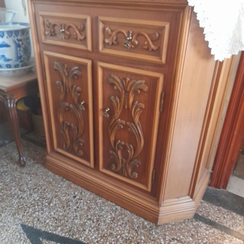 Carved furniture like new with 2 drawers and lower bar cabinet