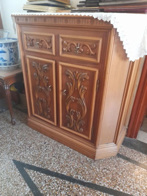 Carved furniture like new with 2 drawers and lower bar cabinet