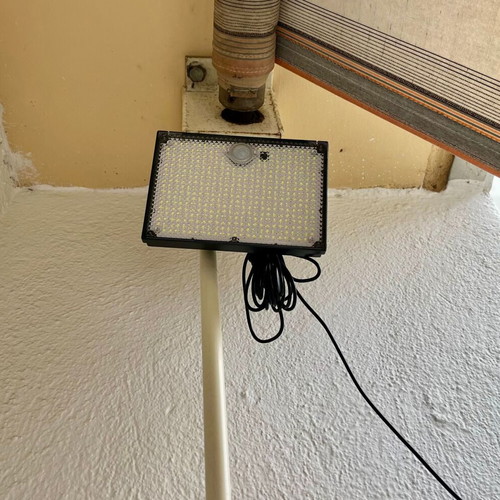 Solar LED Floodlight with Remote Control and Motion Sensor, New