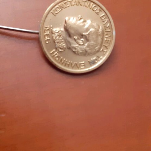 Collectible pin 1966 like new, gold-colored