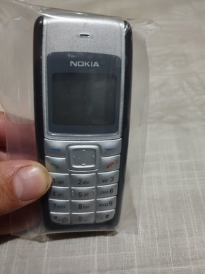 Nokia 1112 нов с протектор, батерия и оригинално зарядно