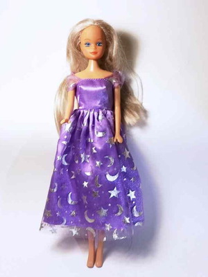 Simba Steffi Love doll used with small dress tear