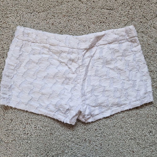 B.young white shorts size L like new with lining