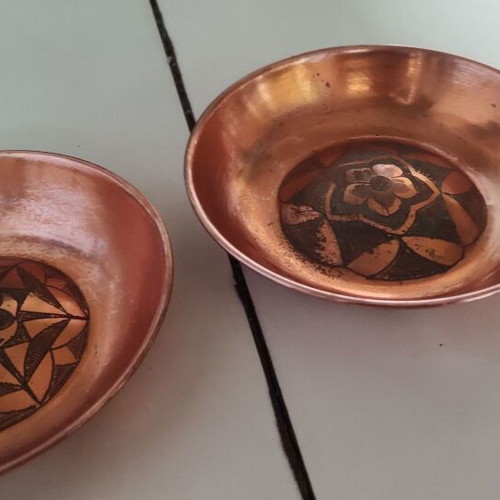 Brass decorative plates set with handmade carving used
