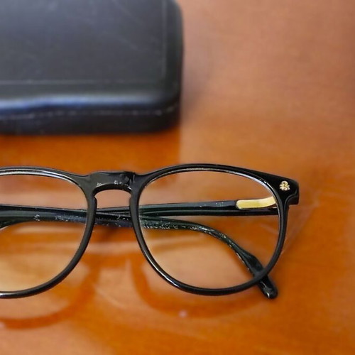 United Colors of Benetton eyeglasses used with hard case, black frame