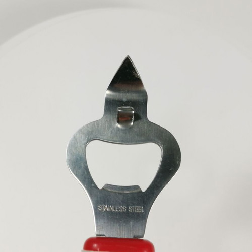 Promotional bottle opener from TOP vinegar used