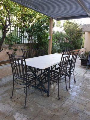 Marble table with 6 metal chairs