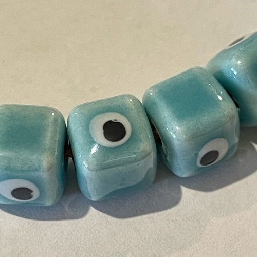 Enamelled ceramic evil eye beads new, pack of 100, turquoise