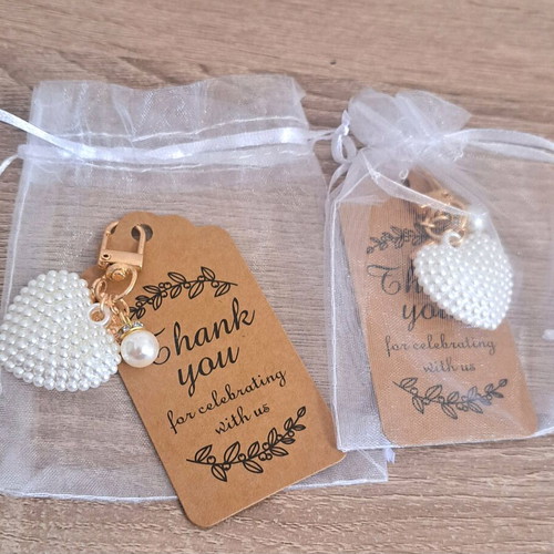 Set of 2 heart keychains with pearl like new
