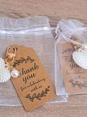 Set of 2 heart keychains with pearl like new