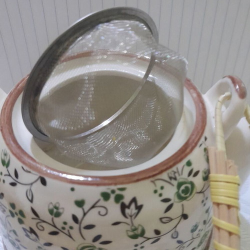 Porcelain teapot 700 ml with strainer, like new, white with green flowers