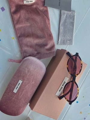 Miu Miu MU 04ZS sunglasses like new, tortoise with pink mirror