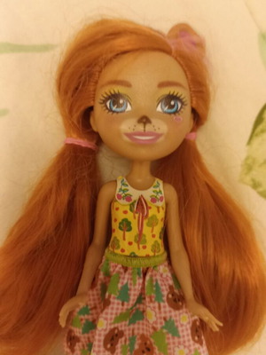Doll with her pet like new