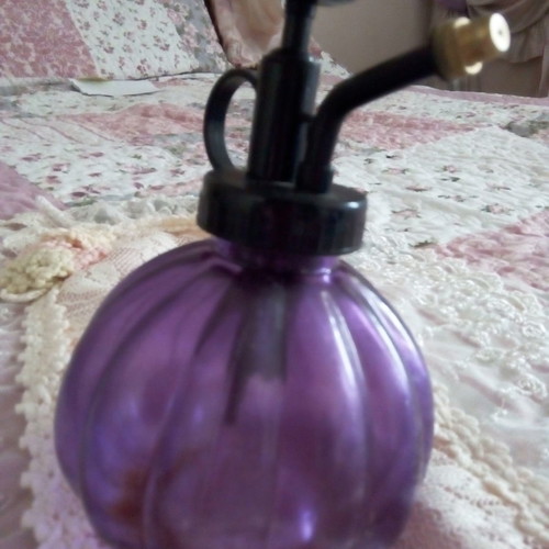 Antique cologne atomizers used, blue and purple