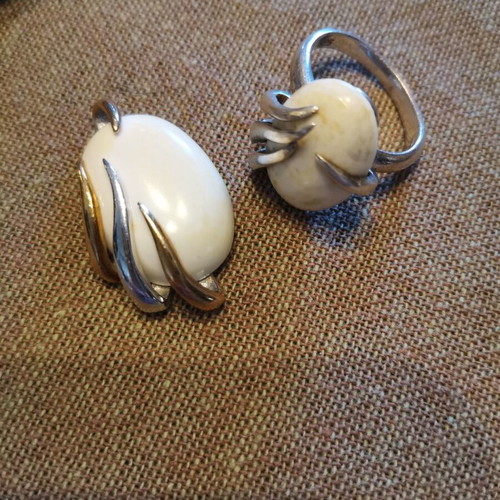 Silver 925 set with white stones used, possibly white coral