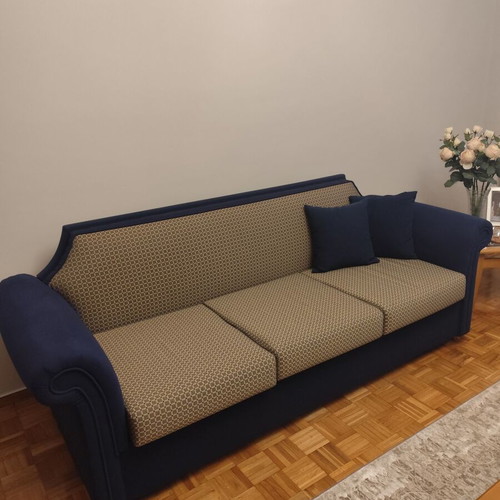 Living room set like new with sofa bed, loveseat with storage, and armchair