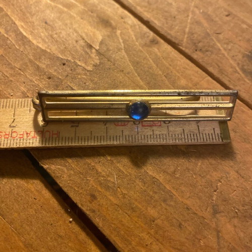 Metal tie clip used, gold color, 6 cm length