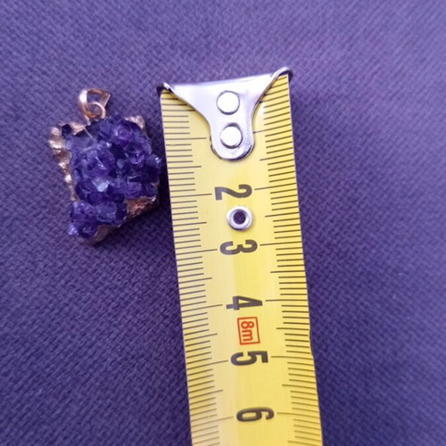 Necklace with amethyst energy crystal