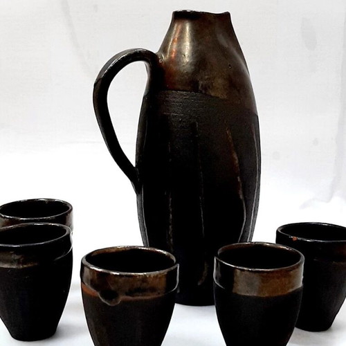 Vintage ceramic alcohol set with jug and 5 cups used