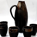 Vintage ceramic alcohol set with jug and 5 cups used