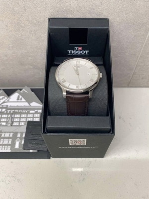 Tissot Tradition watch with brown leather strap