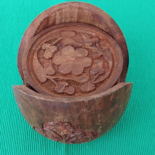 Handmade wooden coasters like new, set of six with carved floral designs