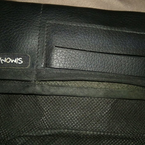Smoking case used with compartments for filters, rolling papers, and lighter