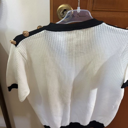 Blouse with gold buttons like new, black and white, one size