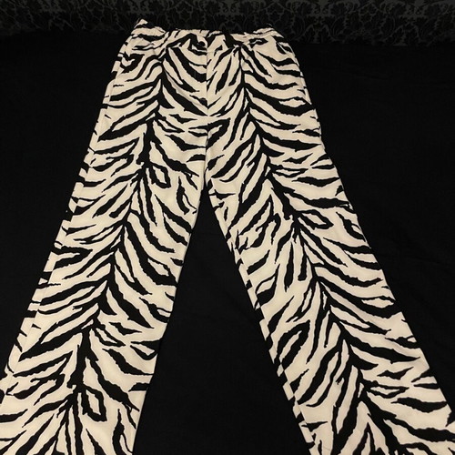 Access bell-bottom pants like new, black and white, size XL