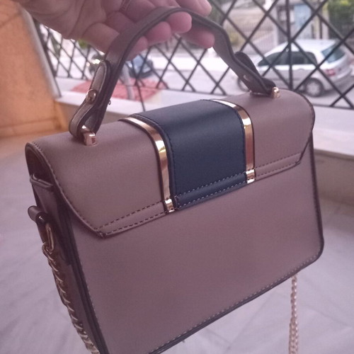 Nude shoulder and hand bag with blue and gold chain like new
