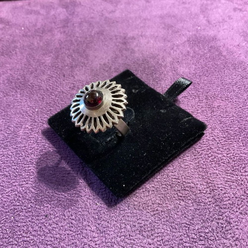 Silver ring with granite stone used with intricate design