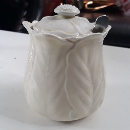 White porcelain sugar bowl used without spoon