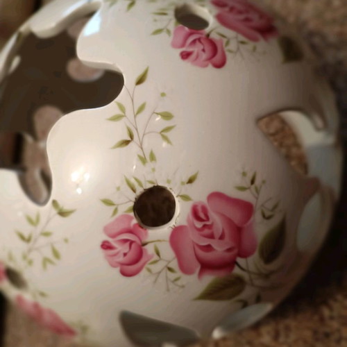 Ceramic lamp shade used with decorative design