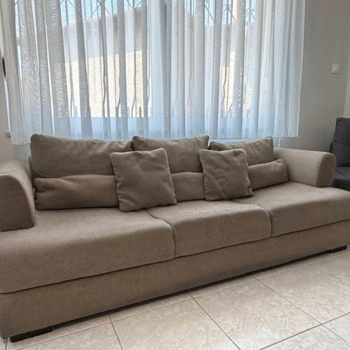 Three-seater fabric sofa in beige-grey