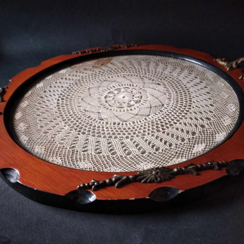 Vintage wooden serving tray used with brass handles